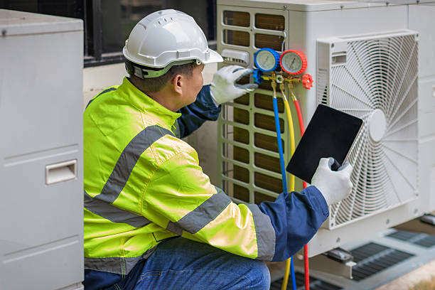 Professional Heat Pump Repair technician working in Fairview, OK